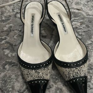 black detailed Manolo Blahnik pointed toe slingback heels